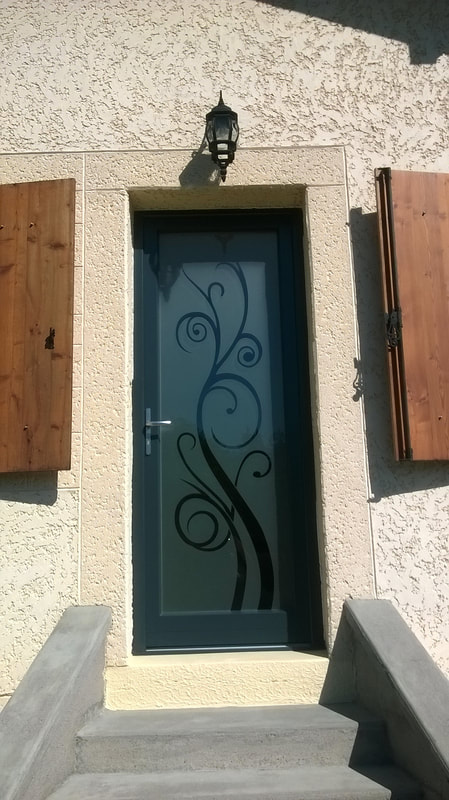 fabrication de portes d'entrée vitrage décor