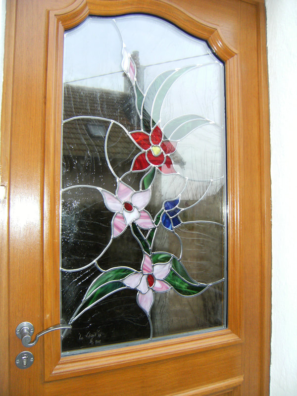 fabrication de portes d'entrée avec vitraux